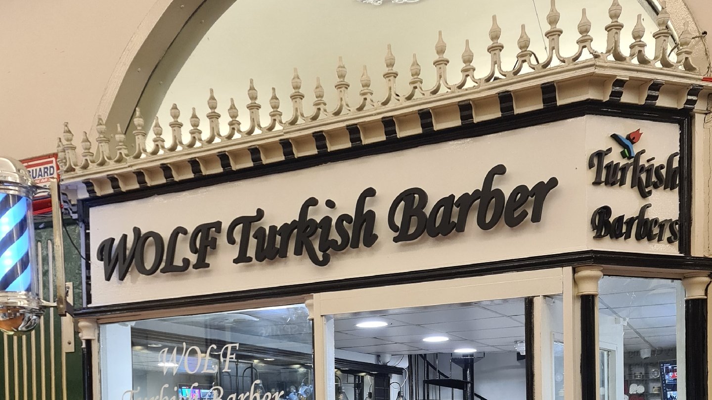WOLF Turkish Barber shopfront at Unit 5 in Cork’s English Market, with barber pole